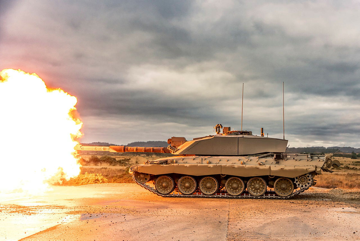 Pictured: The Challenger 2 test firing its 120mm rifled gun (L30A1). The Challenger 2 is a main battle tank, designed to destroy other tanks. It has been used by the British Army on operations in Bosnia and Herzegovina, Kosovo and Iraq, and has never experienced a loss at the hands of the enemy. Built in the UK by Vickers Defence Systems, now BAE Systems and Land Armaments, it was designed as a replacement to the Challenger 1 tank in 1986 and has been in service with the British Army since July 1994. Challenger 2 is used by four armoured regiments, based in the South West of England at Tidworth, Wiltshire, and Bovington, Dorset. The regiments are called The Queen’s Royal Hussars, The King’s Royal Hussars, The Royal Tank Regiment, and The Royal Wessex Yeomanry which is the reserve regiment. Each regiment operates 56 Challenger 2 tanks and a similar number of supporting vehicles in tasks such as reconnaissance and ammunition supply.